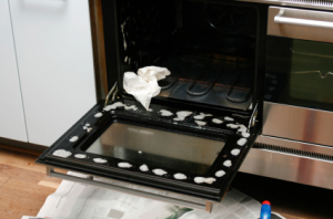 Cleaning range oven