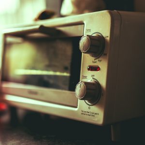 white toaster oven selective focus photography
