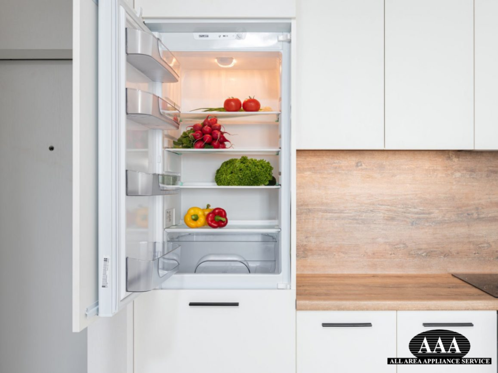 Opened, well-maintained refrigerator showing efficient cooling after professional refrigerator repair.